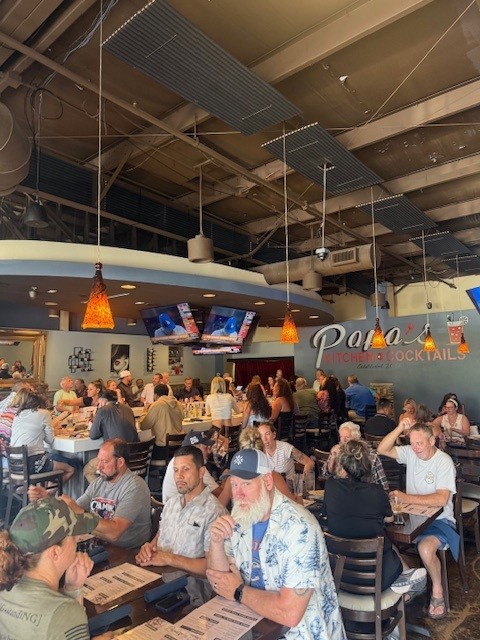 Full house enjoying drinks and food at Papa's